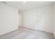 Spacious bedroom featuring neutral walls and plush carpet and convenient access to an ensuite bathroom at 1212 Solace Way, Rolesville, NC 27571
