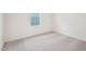 Cozy bedroom featuring neutral walls, plush carpeting, and a bright window at 1212 Solace Way, Rolesville, NC 27571