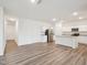 Bright living area offering hardwood floors and an open-concept design, perfect for flexible living at 1212 Solace Way, Rolesville, NC 27571