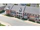 Charming townhomes with manicured lawns and welcoming front porches at 1312 Regulator St, Raleigh, NC 27603