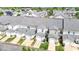 Aerial view showcases well-maintained townhomes with private garages at 1312 Regulator St, Raleigh, NC 27603
