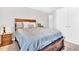 Bedroom featuring a bed, dresser, and ample closet space at 1312 Regulator St, Raleigh, NC 27603