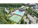 The community pool and tennis court are complemented by lush surroundings at 1312 Regulator St, Raleigh, NC 27603