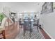 Dining area featuring hardwood floors and a decorative rug at 1312 Regulator St, Raleigh, NC 27603
