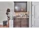 Kitchenette with sleek countertop and stylish fixtures at 1312 Regulator St, Raleigh, NC 27603
