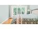 Comfortable bedroom with large window, and beautiful backyard view at 1317 Woodgate Manor Ct, Raleigh, NC 27614