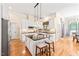 Spacious kitchen boasts an island with seating, stainless steel appliances, and open layout at 1317 Woodgate Manor Ct, Raleigh, NC 27614