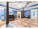 Comfortable main bedroom featuring a canopy bed, hardwood floors, blue walls and recessed lighting at 1317 Woodgate Manor Ct, Raleigh, NC 27614