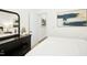Bright bedroom featuring modern decor, a stylish dresser, and an inviting, comfortable bed at 137 Azalea View Way, Holly Springs, NC 27540