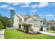 Charming two-story home with manicured lawn and attached two car garage in quiet neighborhood at 137 Azalea View Way, Holly Springs, NC 27540