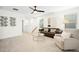 Spacious living room features comfortable seating, stylish decor, and ample natural light at 137 Azalea View Way, Holly Springs, NC 27540