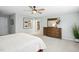 Spacious main bedroom with a large dresser and mirror, leading to an ensuite bathroom at 137 Azalea View Way, Holly Springs, NC 27540