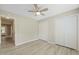 Bedroom featuring light wood floors, neutral paint, and ceiling fan at 1409 Beckworth Ct, Garner, NC 27529