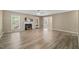 A spacious living room featuring a fireplace and luxury vinyl plank flooring at 1409 Beckworth Ct, Garner, NC 27529