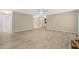 Spacious living area showcasing luxury vinyl plank floors and neutral wall paint at 1409 Beckworth Ct, Garner, NC 27529