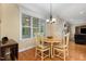 Eat in breakfast area with natural light, hardwoods and views of Gathering room at 142 Crestline Dr, Selma, NC 27576