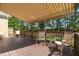 Relaxing deck with awning and comfortable seating at 142 Crestline Dr, Selma, NC 27576