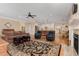Spacious living room showcasing open layout to kitchen and fireplace, perfect for entertaining at 142 Crestline Dr, Selma, NC 27576