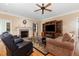 Bright living room with a fireplace and media center offering a cozy, relaxing atmosphere at 142 Crestline Dr, Selma, NC 27576