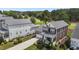 Aerial view of the home showcasing its well-manicured lawn and proximity to a golf course at 1508 Heritage Reserve Ct, Wake Forest, NC 27587