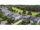 Aerial view of homes near the golf course with manicured lawns and tree-lined streets at 1508 Heritage Reserve Ct, Wake Forest, NC 27587