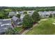 Charming two-story home features a screened porch and well-manicured lawn bordering a green golf course at 1508 Heritage Reserve Ct, Wake Forest, NC 27587