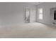 Spacious bedroom features carpet, a window, and an ensuite bathroom at 1508 Heritage Reserve Ct, Wake Forest, NC 27587