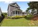 Beautiful home with a screened porch and well-maintained lawn at 1508 Heritage Reserve Ct, Wake Forest, NC 27587