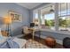 Comfortable home office with a view of the front porch and surrounding greenery at 1508 Heritage Reserve Ct, Wake Forest, NC 27587
