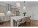 Well-equipped kitchen featuring a large island, stainless steel appliances, and ample counter space at 1508 Heritage Reserve Ct, Wake Forest, NC 27587