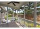 Inviting screened-in porch provides views of the lush backyard and a relaxing atmosphere at 1508 Heritage Reserve Ct, Wake Forest, NC 27587