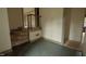 Open foyer with dark stone floor, stairs, and doorway to other rooms at 1513 Western Ave, Rocky Mount, NC 27804