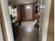 Functional laundry room featuring ample shelving and a washer dryer at 2037 Swepsonville Rd, Graham, NC 27253