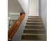 Carpeted staircase leading to the upper level of the home at 2037 Swepsonville Rd, Graham, NC 27253