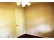 Simple bedroom featuring hardwood floors, light walls, and a convenient closet at 2071 Meadow Ln, Graham, NC 27253