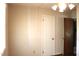 Bedroom with a classic look features light walls and view to adjacent room at 2071 Meadow Ln, Graham, NC 27253