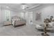 Relaxing bedroom features tray ceilings, recessed lighting, and neutral decor at 2121 Vecchio Ln, Apex, NC 27502