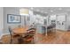 Bright and spacious kitchen with dining area and large island with seating for four at 2121 Vecchio Ln, Apex, NC 27502