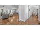 Spacious open floorplan features hardwood floors, bright windows and neutral paint at 2121 Vecchio Ln, Apex, NC 27502