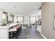 Open concept living space featuring a spacious kitchen with a center island, dining and living room at 218 Macon Lake Drive # 43, Apex, NC 27523