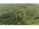 Aerial view of property with estimated boundary lines surrounded by a dense green forest at 2283 Mays Chapel Rd, Sanford, NC 27330