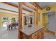 Open kitchen with granite island, custom cabinets, and seamless flow into the dining and living areas at 2283 Mays Chapel Rd, Sanford, NC 27330