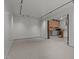Large, light-filled living room with neutral carpet, recessed lighting and an open doorway to the kitchen at 2283 Mays Chapel Rd, Sanford, NC 27330