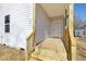 New back porch with wooden stairs and railing, ready for relaxation and outdoor enjoyment at 2301 Pinecroft Dr, Burlington, NC 27217