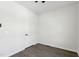 Bright bedroom with vinyl floors, neutral walls, and a ceiling fan at 2301 Pinecroft Dr, Burlington, NC 27217