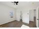 A bedroom featuring new floors, fresh paint, new light fixtures, and entry to the main bath at 2301 Pinecroft Dr, Burlington, NC 27217