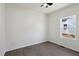 Bright bedroom with vinyl floors and a view to the outside at 2301 Pinecroft Dr, Burlington, NC 27217