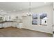 Open kitchen with stainless steel appliances and granite countertops at 2301 Pinecroft Dr, Burlington, NC 27217