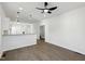 Open concept space with vinyl flooring and neutral color palette at 2301 Pinecroft Dr, Burlington, NC 27217