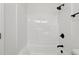 A close up view of a shower with adjustable shower heads at 2301 Pinecroft Dr, Burlington, NC 27217